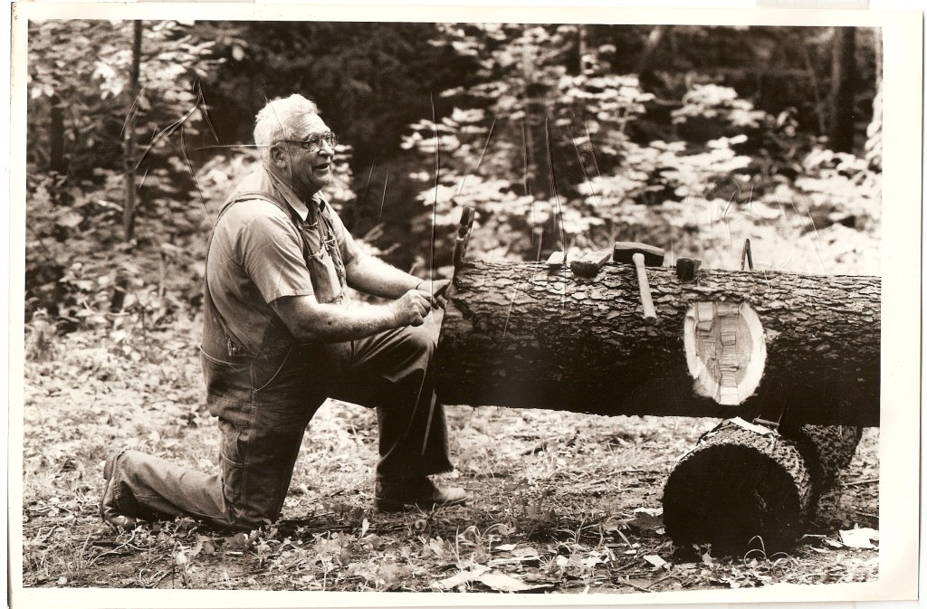 Lloyd Weddell  teaching log hewing at Bob Evan's Farm copy